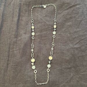 Black house/white market necklace